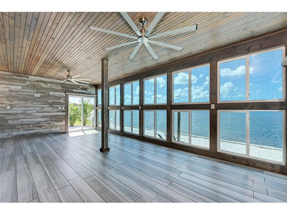 Large covered lanai with spectacular views - Single Family Home for sale at 949 Suncrest Ln, Englewood, FL 34223 - MLS Number is D6120396