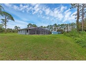 Single Family Home for sale at 1891 Tropicaire Blvd, North Port, FL 34286 - MLS Number is D6121425