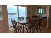 You can also enjoy the great view from the dining room. - Single Family Home for sale at 1900 Illinois Ave, Englewood, FL 34224 - MLS Number is D6121965