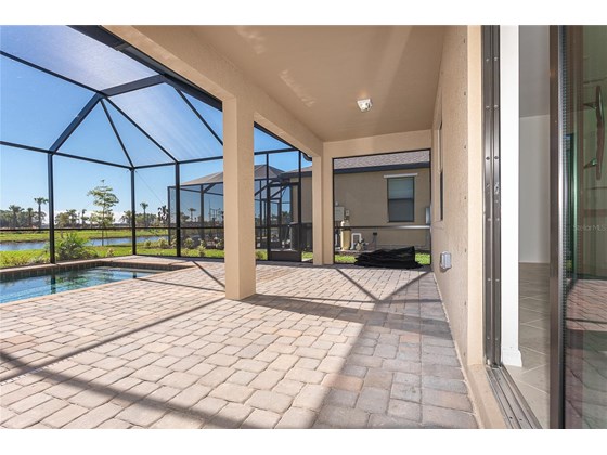 Large lanai for entertaining with brick pavers - Single Family Home for sale at 1837 East Isles Rd, Port Charlotte, FL 33953 - MLS Number is D6122330