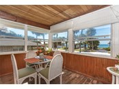 Upper Unit Lanai Space with Stunning Views - Duplex/Triplex for sale at 4076 N Beach Rd #10 & 11, Englewood, FL 34223 - MLS Number is D6122744