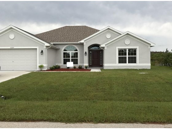 Single Family Home for sale at 15209 Hennipen Cir, Port Charlotte, FL 33981 - MLS Number is O5969982