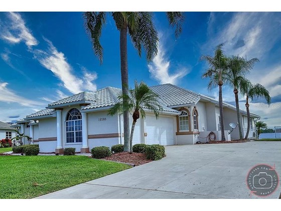 Single Family Home for sale at 12586 Bacchus Rd, Port Charlotte, FL 33981 - MLS Number is W7839926