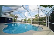 Single Family Home for sale at 1711 Belle Ct, Punta Gorda, FL 33950 - MLS Number is C7447035