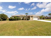 Front - Single Family Home for sale at 120 Sinclair St Sw, Port Charlotte, FL 33952 - MLS Number is C7450500