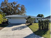Single Family Home for sale at 18385 Hottelet Cir, Port Charlotte, FL 33948 - MLS Number is C7451811