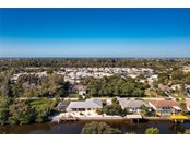 140'PLUS OF WATERFRONT AND CEMENT SEAWALL! JUST IMAGINE WHERE YOU CAN GO! - Single Family Home for sale at 3400 Colony Ct, Punta Gorda, FL 33950 - MLS Number is C7451906