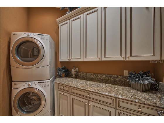 Master Closets include a Laundry Closet with Washer & Dryer - Single Family Home for sale at 8499 Lindrick Ln, Bradenton, FL 34202 - MLS Number is A4475594