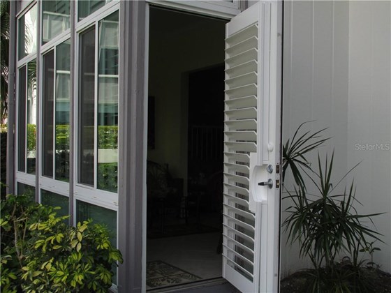EXIT BACKDOOR TO LAGOON AREA - Condo for sale at 1087 W Peppertree Dr #221d, Sarasota, FL 34242 - MLS Number is A4493593