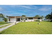 Front - Single Family Home for sale at 2440 Manasota Beach Rd, Englewood, FL 34223 - MLS Number is A4509005
