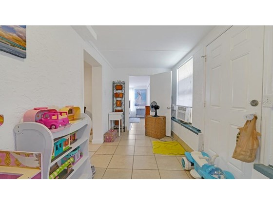 corridor connecting master bedroom with master bathroom, has it's own entrance - Single Family Home for sale at 2440 Manasota Beach Rd, Englewood, FL 34223 - MLS Number is A4509005