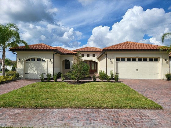 Contemporary Modern Home with a grand courtyard upon entrance. - Single Family Home for sale at 1702 7th St E, Palmetto, FL 34221 - MLS Number is A4514313