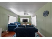 Living room - Single Family Home for sale at 104 Portia St N, Nokomis, FL 34275 - MLS Number is A4514916