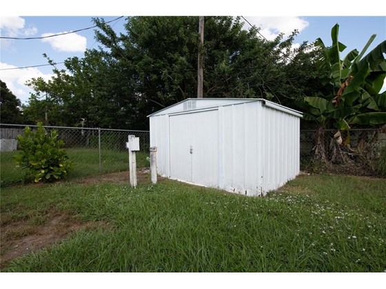 Backyard shed - Single Family Home for sale at 104 Portia St N, Nokomis, FL 34275 - MLS Number is A4514916