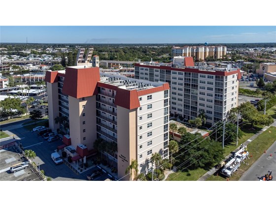 Aerial view of Venice Costa Brava looking to the E; 244 Saint Augustine is the building in the forefront. - Condo for sale at 244 Saint Augustine Ave #104, Venice, FL 34285 - MLS Number is A4518081