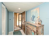 Entry to unit; Pantry and Utility closet to the left - Condo for sale at 450 Gulf Of Mexico Dr #B107, Longboat Key, FL 34228 - MLS Number is A4520786