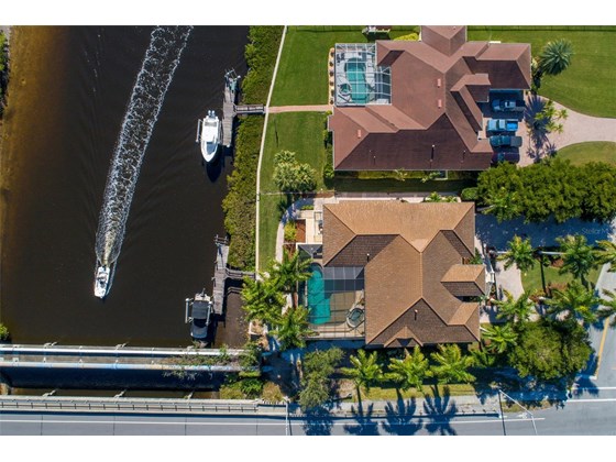 Relax and watch the boats go by from your second story pool and lanai - Single Family Home for sale at 1012 Bayview Dr, Nokomis, FL 34275 - MLS Number is A4521028