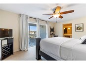 Master Bedroom w Balcony View - Condo for sale at 316 108th St W #316, Bradenton, FL 34209 - MLS Number is A4521142