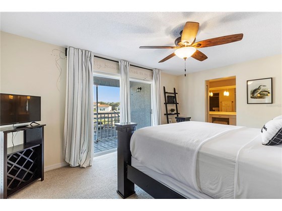 Master Bedroom w Balcony View - Condo for sale at 316 108th St W #316, Bradenton, FL 34209 - MLS Number is A4521142