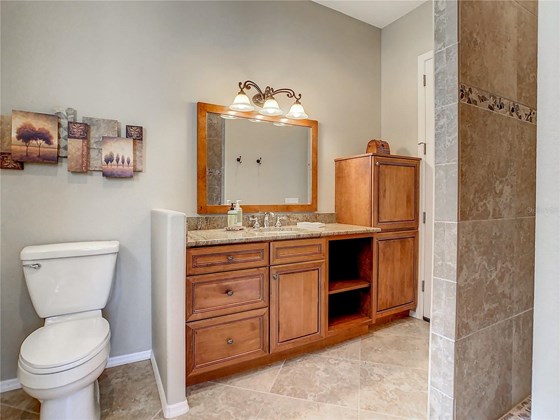 Ensuite in the casita provides a BEAUTIFUL POOL BATH - Single Family Home for sale at 319 Stone Briar Creek Dr, Venice, FL 34292 - MLS Number is A4522164