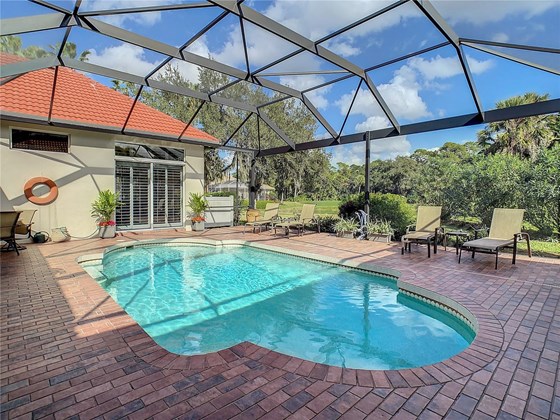 Panoramic view screen adds beauty to this rarely available home - Single Family Home for sale at 319 Stone Briar Creek Dr, Venice, FL 34292 - MLS Number is A4522164