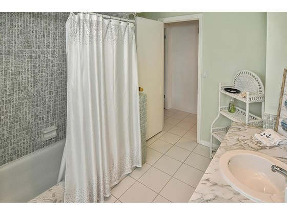 Guest bathroom - Single Family Home for sale at 19 Oakwood Dr N #19, Englewood, FL 34223 - MLS Number is N6118266