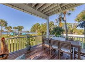 2nd level Porch facing Pool House and bay - Single Family Home for sale at 6751 Portside Ln, Englewood, FL 34223 - MLS Number is N6118322