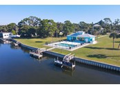 Community dock outside pool (no overnight docking).Bring your Kayak/Canoe/Paddleboard/Fishing Rod! - Single Family Home for sale at 6751 Portside Ln, Englewood, FL 34223 - MLS Number is N6118322